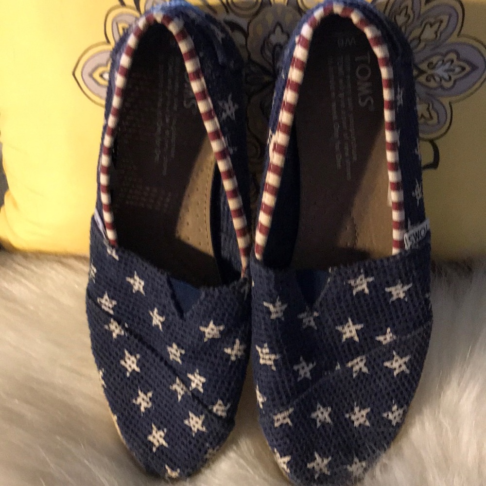 Red white and blue Toms shoes